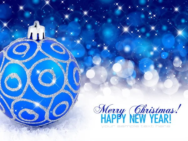 Christmas blue ball on a festive background — Stock Photo, Image
