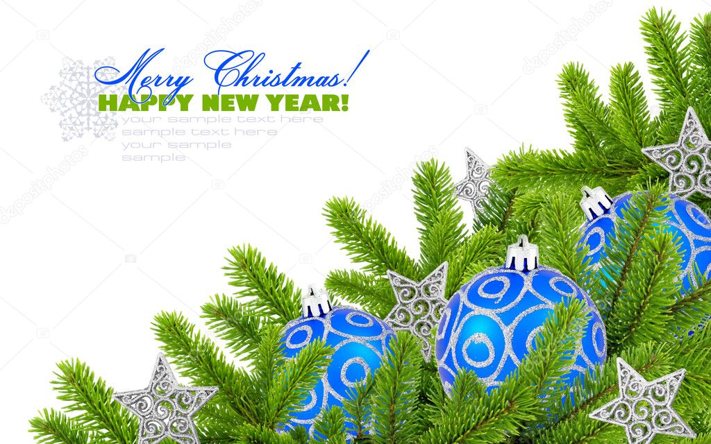 Blue and silver christmas decoration baubles and pine on white b