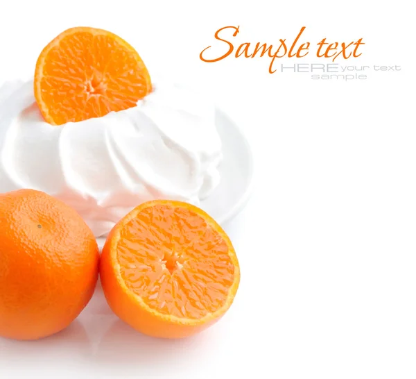 Cream with tangerines on a white background — Stock Photo, Image