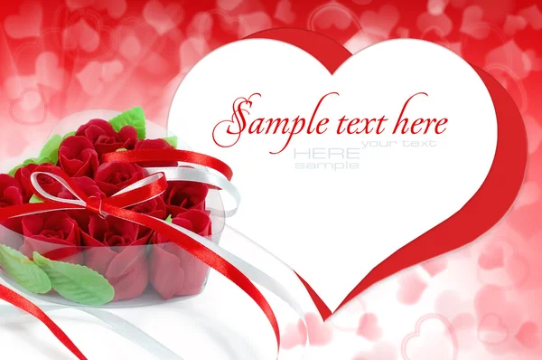 Heart-shaped box with red roses on a background a hearts — Stock Photo, Image