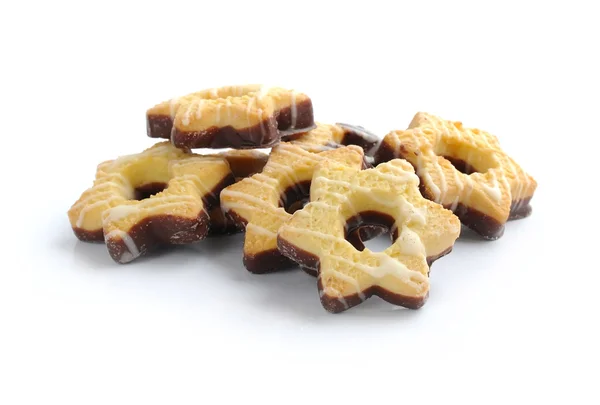 Biscoitos em um chocolate em um fundo branco — Fotografia de Stock