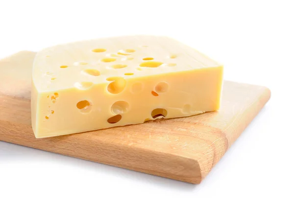 Piece of cheese on a wooden board on a white background — Stock Photo, Image