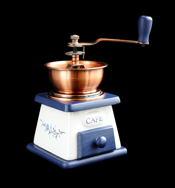 Old-fashioned coffee grinder on a black background — Stock Photo, Image
