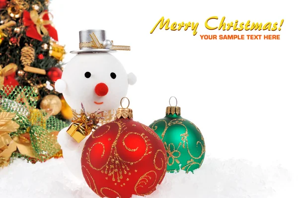 Kerstballen met een sneeuwpop — Stockfoto