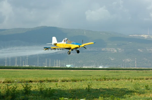 Κίτρινο γεωργικών αεροπλάνο Εικόνα Αρχείου