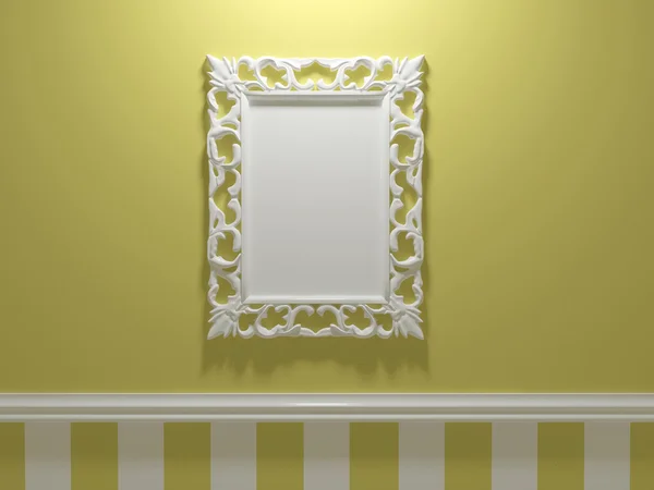 Antique white ornamented picture frame on the wall — Stock Photo, Image