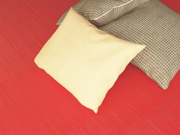 Kırmızı zemin üzerinde kahverengi Tekstil yastıklar. — Stok fotoğraf