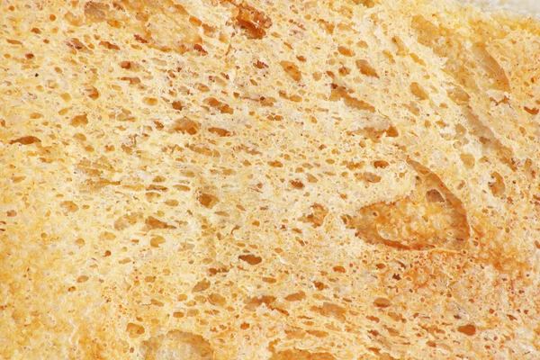 结壳的面包作为背景。宏 — 图库照片