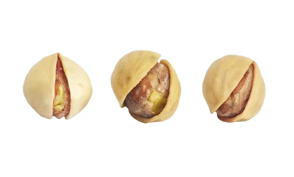 Close up van pimpernoten (pistaches) noten in geïsoleerde witte achtergrond — Stockfoto
