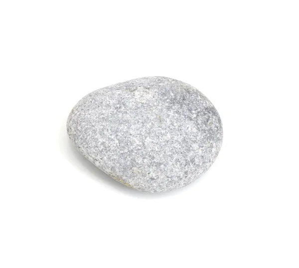 Камень на белом фоне — стоковое фото