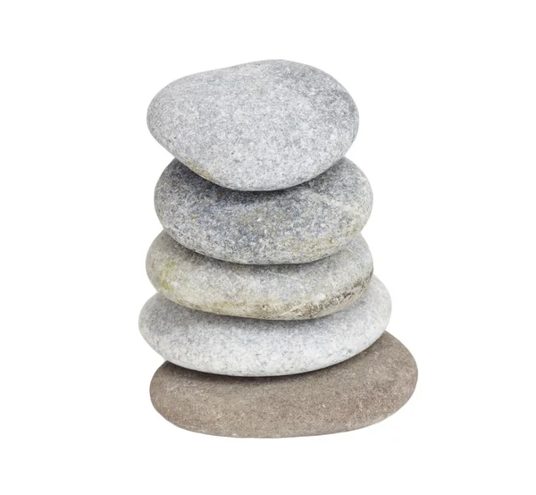 Piedras colocadas una sobre la otra sobre un fondo blanco — Foto de Stock