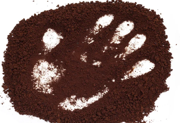 Handprint on the background of coffee — Stock Photo, Image