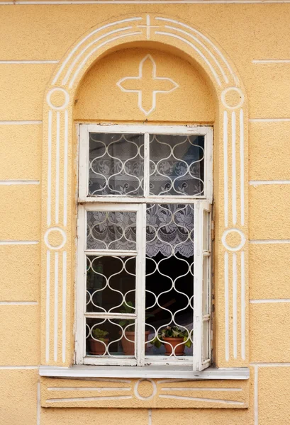 Open window with flowers — Stok fotoğraf