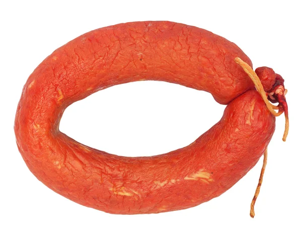 Salsicha saborosa é reduzida por um anel encontra-se em um fundo branco — Fotografia de Stock