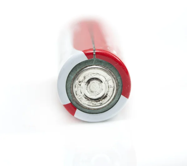 Macro bateria vermelha no fundo branco — Fotografia de Stock