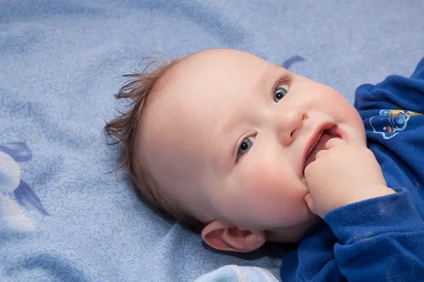 Closeup portrait of cute smiling baby boy — Stock Photo, Image