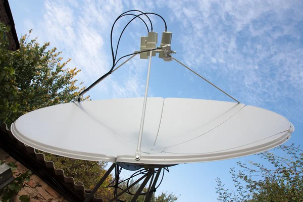 The satellite dish antenna is vital for modern communications — Stock Photo, Image