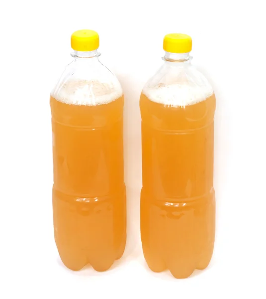 Twee plastic flessen met bier — Stockfoto