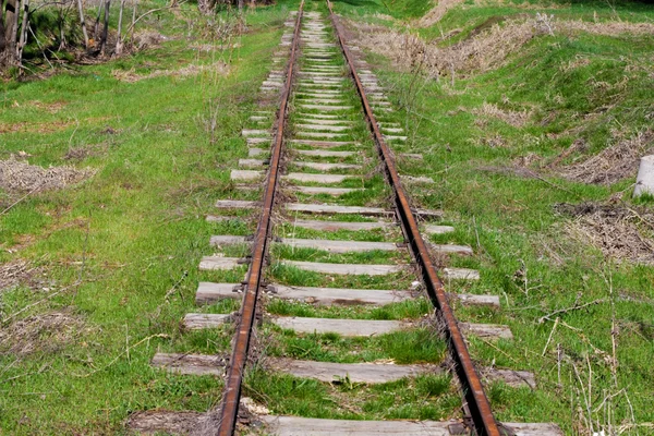 Old railway track on the morning hills landscape — Stock Photo, Image