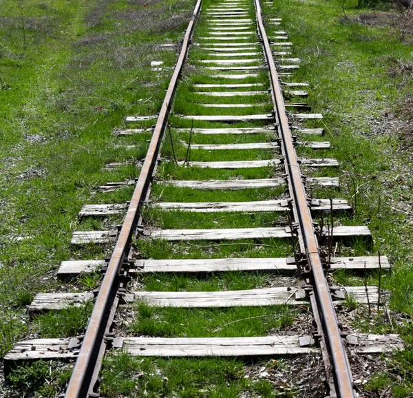 Old railway track on the morning hills landscape — Stock Photo, Image