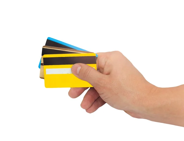 Три кредитні картки в руці — стокове фото