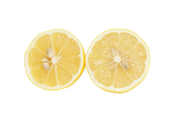 Dos mitades de limón fresco sobre fondo blanco . —  Fotos de Stock