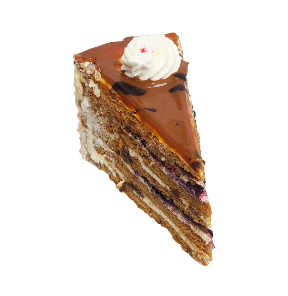 Fatia de bolo de creme com chocolate no fundo branco — Fotografia de Stock