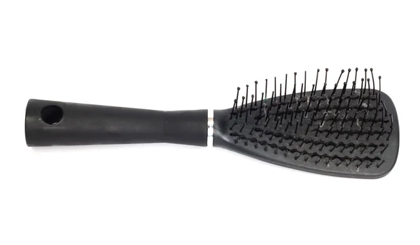 Escova de cabelo, pente no fundo brilhante — Fotografia de Stock