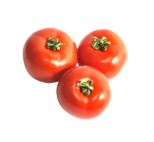 Drei Tomaten isoliert vor weißem Hintergrund — Stockfoto