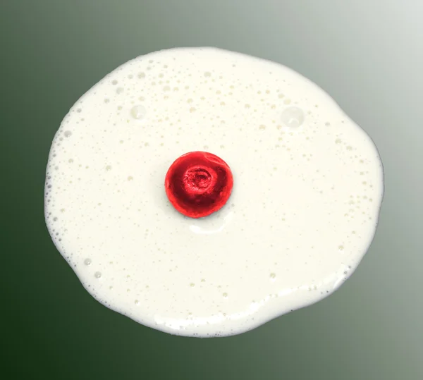Cherry in yogurt — Stock Photo, Image