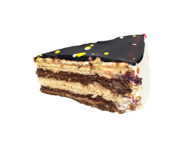 Un trozo de pastel de chocolate, aislado sobre un fondo blanco . — Foto de Stock