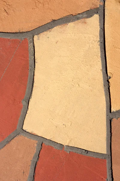 Нерегулярная мозаика наружной стены — стоковое фото