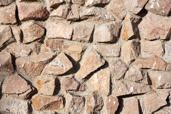 Каменная стена снаружи, фон с хорошей текстурой . — стоковое фото