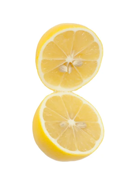 흰색 바탕에 두 신선한 레몬 반쪽. — 스톡 사진