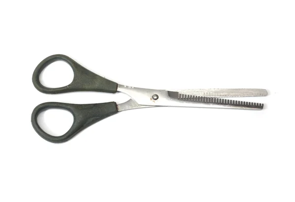 Зазубренные парикмахерские ножницы. Изолированный над белым — стоковое фото