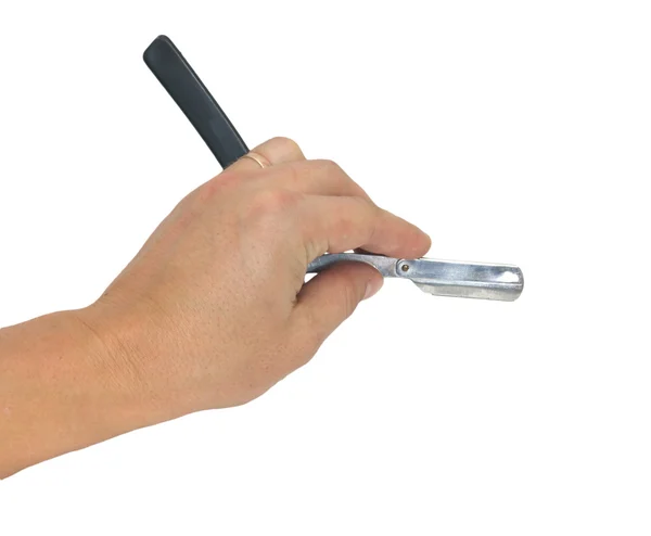 Hand holding classic straight razor on white background — Stock Photo, Image