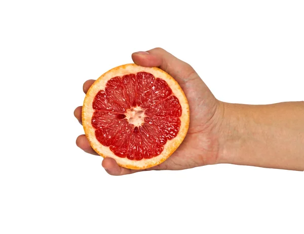 Half of grapefruit in female hand. Isolation. — Stock Photo, Image