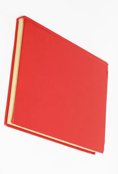 Livro vermelho sobre fundo branco — Fotografia de Stock