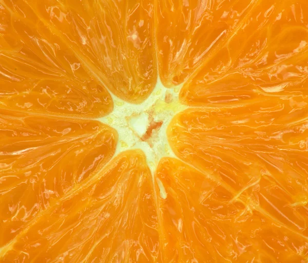 Macro de uma laranja de fundos — Fotografia de Stock