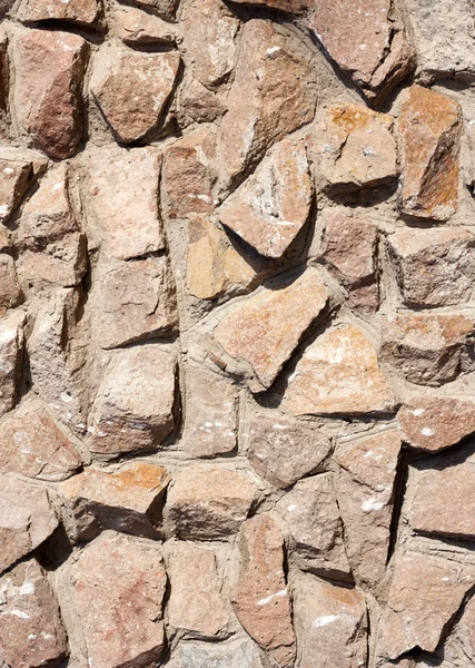 Stenen muur buitenkant, achtergrond met goede textuur. — Stockfoto
