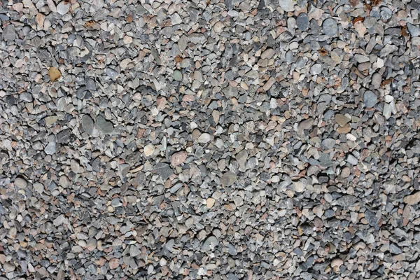 Achtergrond van stenen macadam van verschillende kleuren — Stockfoto