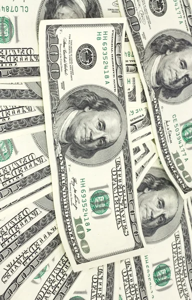 Achtergrond met geld Amerikaanse honderd dollar biljetten — Stockfoto