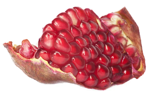 Крайне близко задний план красного сочного спелых гранатовых фруктов — стоковое фото