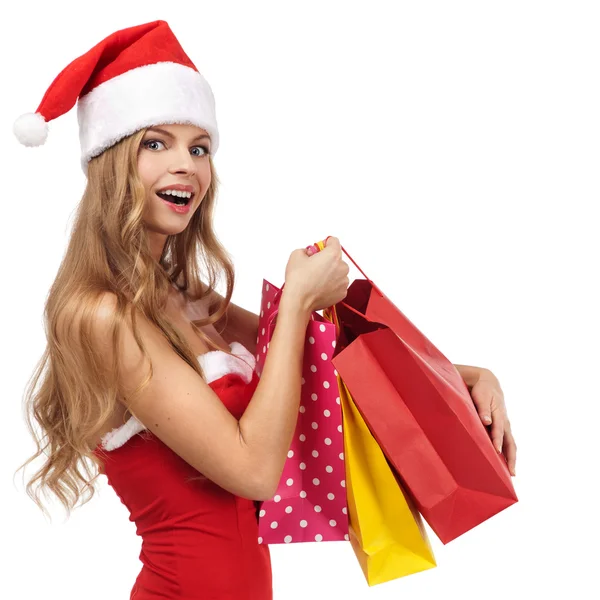 Προσωπογραφία γυναίκας Χριστούγεννα στο santa κοστούμι κρατώντας ένα shoppin — Φωτογραφία Αρχείου