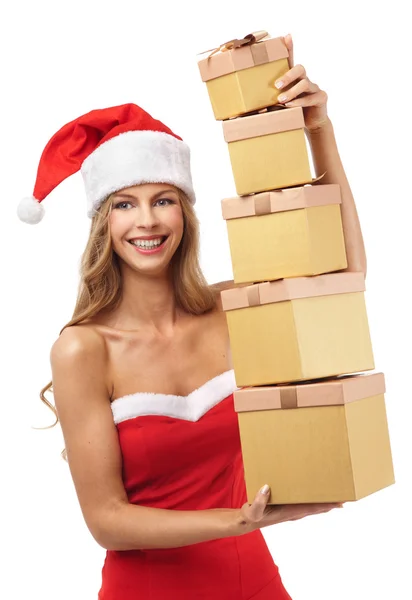 Feliz mujer de Navidad sosteniendo regalos con traje de Santa —  Fotos de Stock