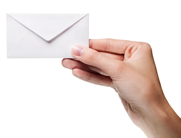 Woman's hand holding closed envelope isolated — Stock Photo, Image