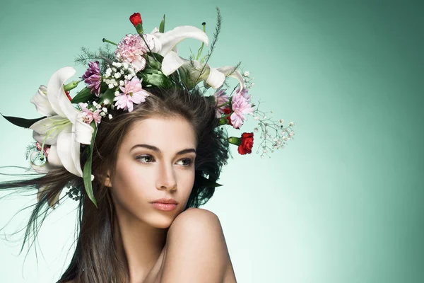 Beautiful woman with flower wreath. Space for text. — Stock Photo, Image