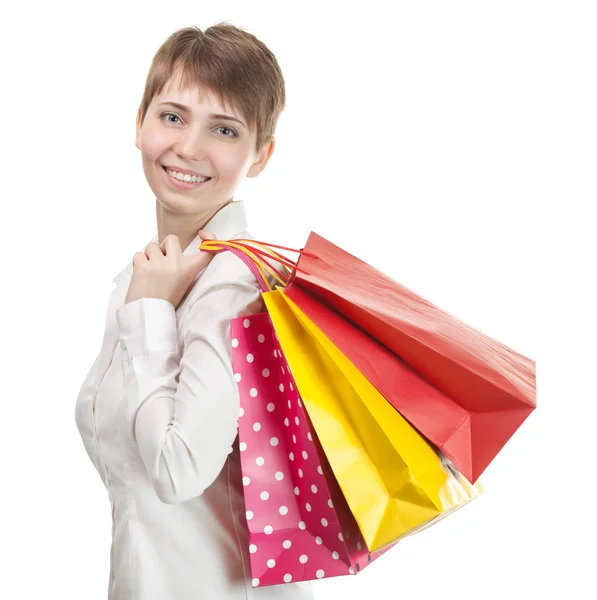 Güzel bir alışveriş kadın mutlu holding alışveriş torbaları. — Stok fotoğraf