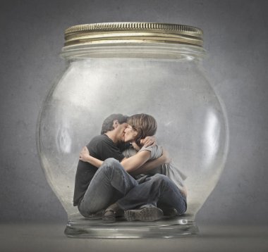 Couple kissing in a jar clipart