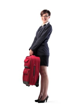 Isolated smiling businesswoman holding a trolley case clipart